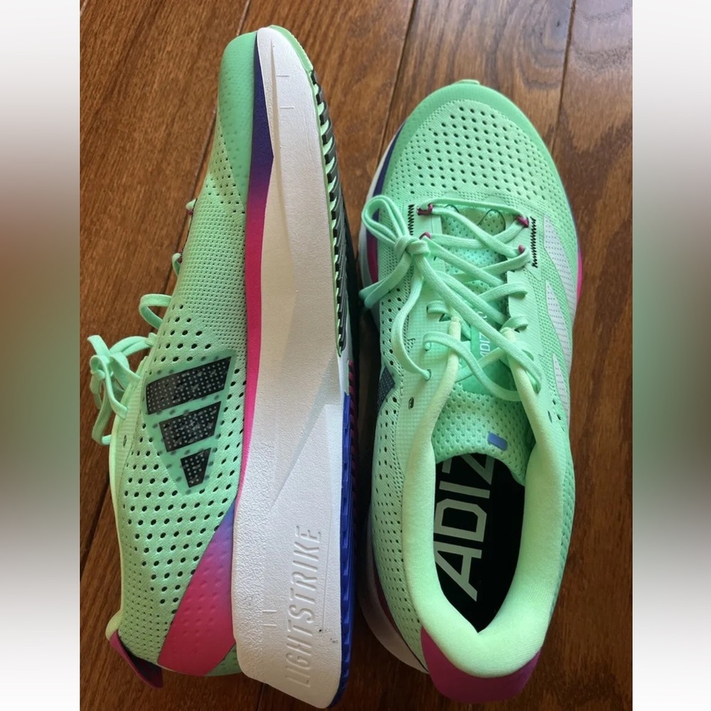 New in box women’s Adidas Adizero size 9.5. Never worn and beautiful!